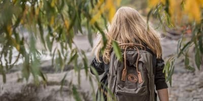 Girl with backpack bug out