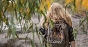 Girl with backpack bug out