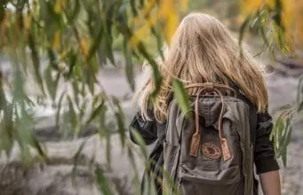 Girl with backpack bug out