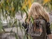 Girl with backpack bug out