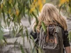 Girl with backpack bug out